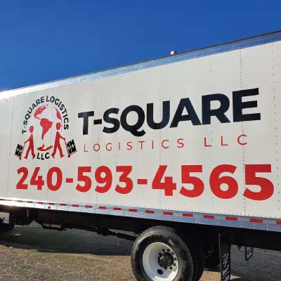 Black and red bock truck vinyl letters with phone number and logo. Text reads: T-Square Logistics LLC