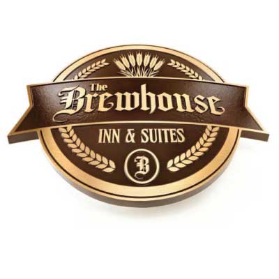 Brown and gold embossed cast metal plaqu with wheat border and logo. Text reads: The Brewhouse Inn & Suites